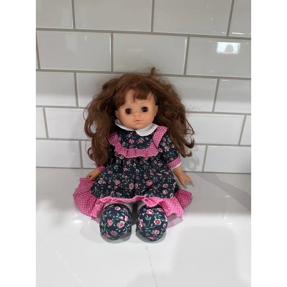 Vintage Brunette Girl Doll Floral Dress Brown Eyes Soft Body Collectible Toy